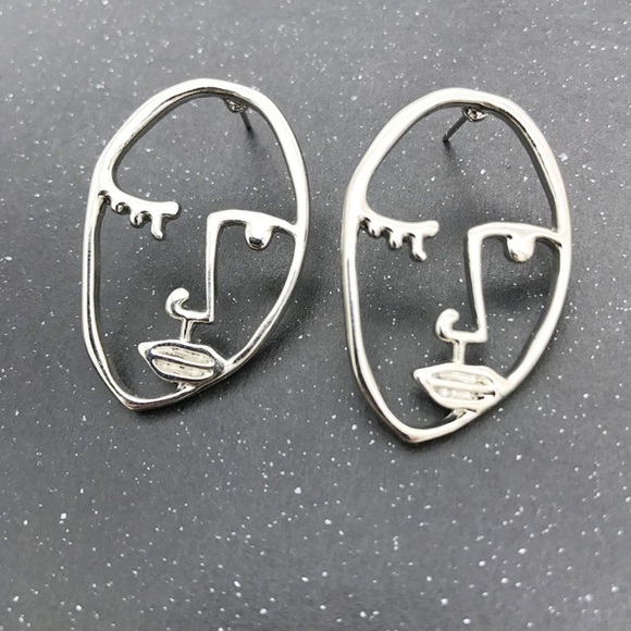 2/$20! Silver Abstract Visage Earrings - Picture 4 of 11
